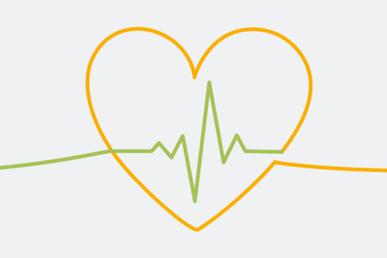 Das Bild zeigt ein Herz mit EKG.